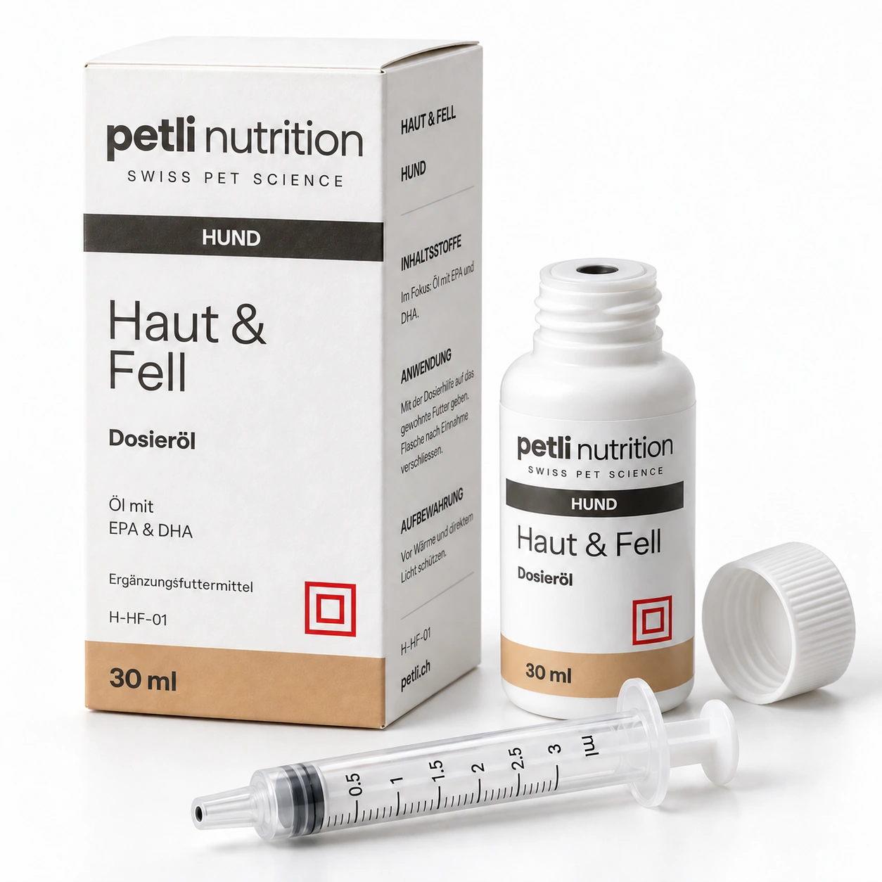 Petli Haut & Fell für Hund: Dosieröl mit zugehöriger Verpackung.